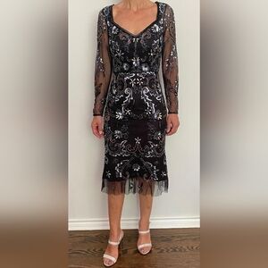 NWT, evening dress, beaded. Midi. Black with sheer sleeves. Size 2